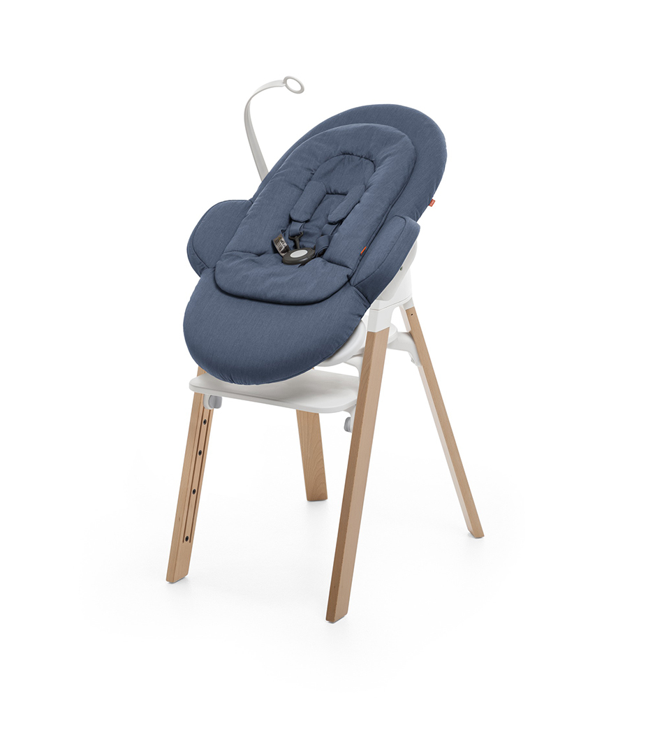 Bouncer, Blue. Mounted on Stokke Steps highchair.